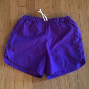 Nico Nico purple retro dolphin running shorts 10